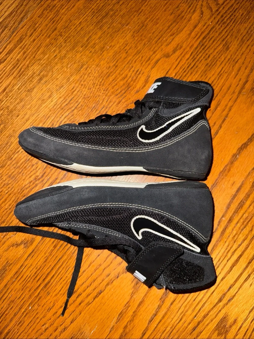 Nike Kids Black High-Top Sneakers with White Swoosh